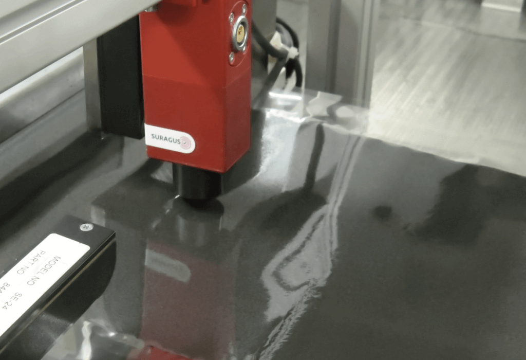 Eddy current inline sensor measures sheet resistance on a coated seperator foil